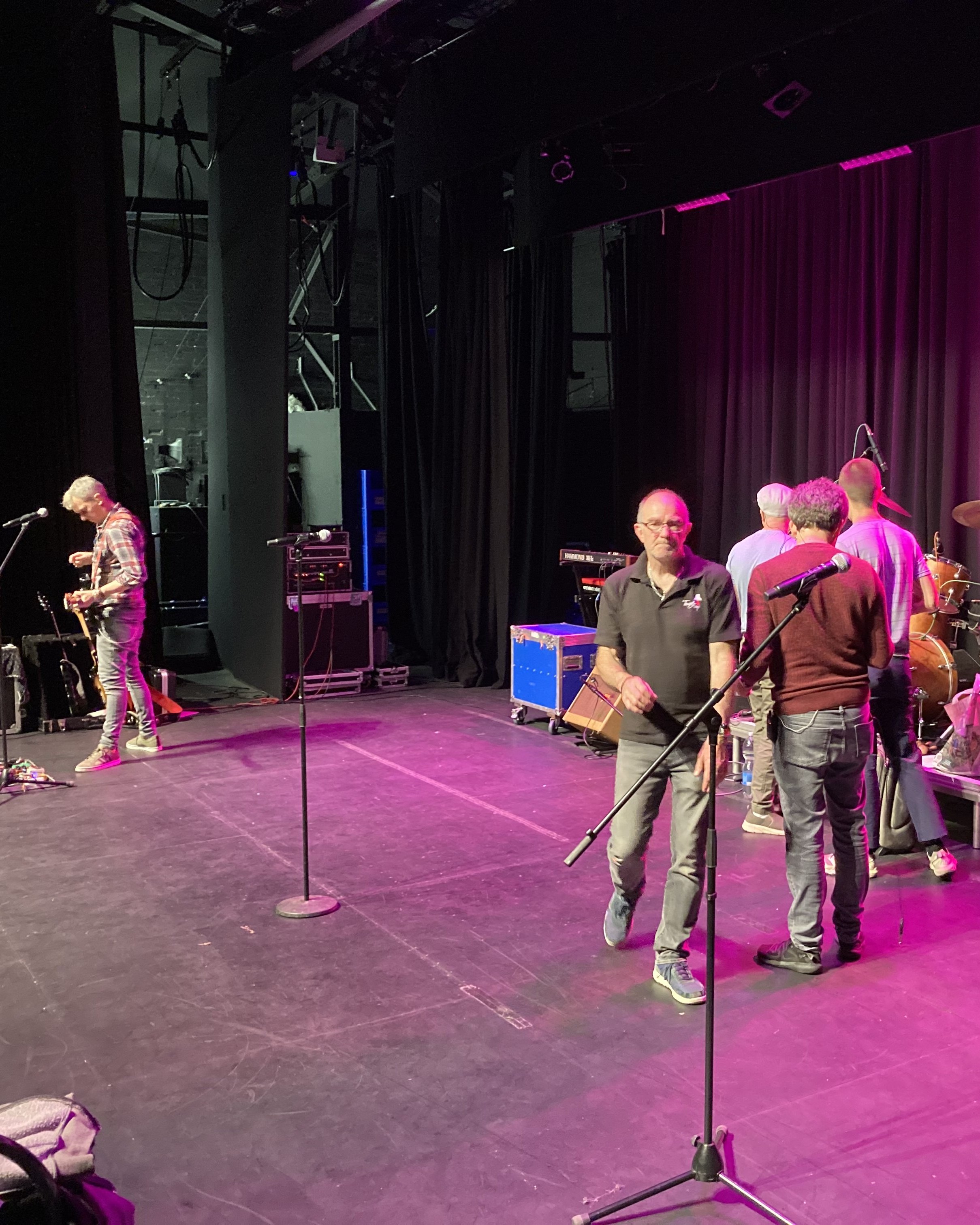 Backstage crew coordination and theatre logistics with The Rolling Clones